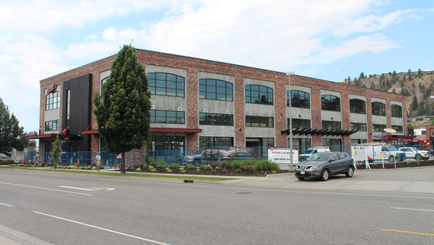 Three story brick commercial building in the heart of Kelowna owned by Worman Commercial