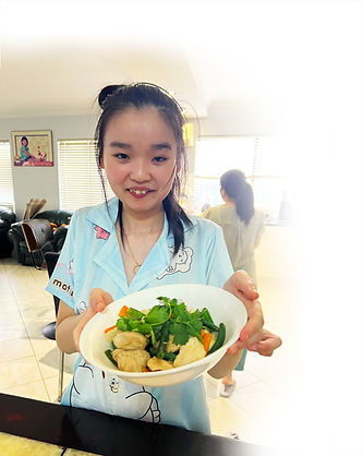 Lena cooking a chicken stir fry.jpg