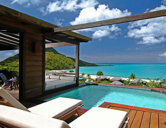 04_Best_Luxury_Caribbean_Hermitage_Bay_Pool-Suite-Loungers-Hermitage-Bay.jpg