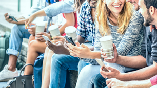 Group of young people on their phones