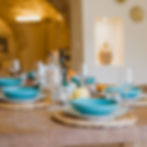 Dining table set for a traditional Puglian meal at Trulli Kyros