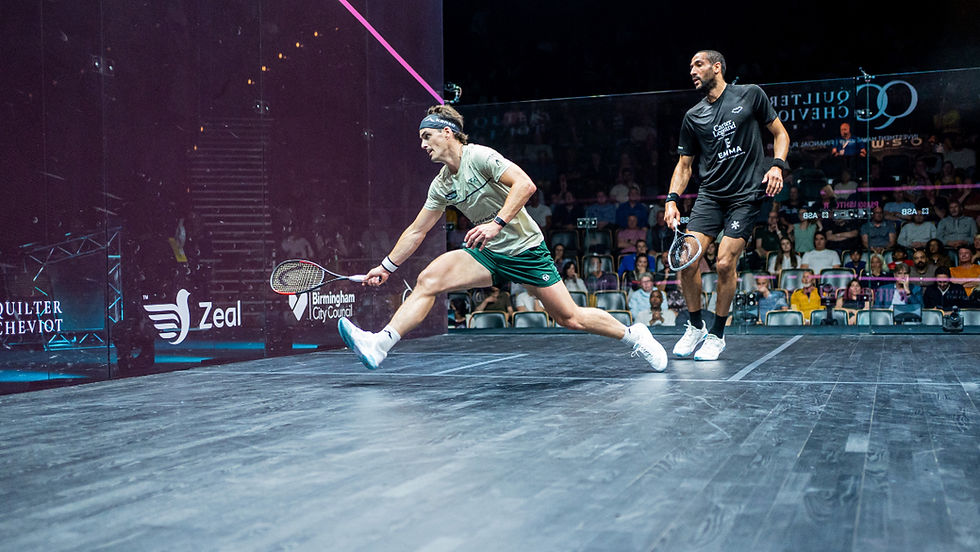 New Zealand's Paul Coll (left) reaches for a forehand in this third round win at the British Open PHOTO: PSA SQUASH TOUR