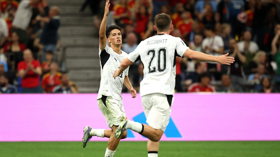 Elijah Just celebrates scoring for New Zealnad in the loss against Belgium PHOTO: OFC/FIFA VIA GETTY IMAGES