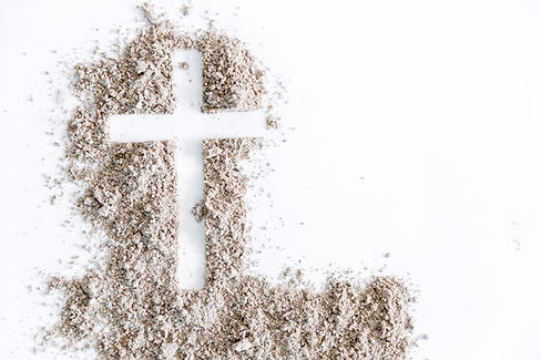vecteezy_christian-cross-or-crucifix-drawing-in-ash-dust-or-sand-as_20173142.jpg