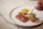Exquisite presentation of Silver Fern Farms’ reserve beef, elegantly garnished and accompanied by a savory jus