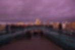 Standing on Millennium Bridge looking at St Paul's Cathedral just after sunset