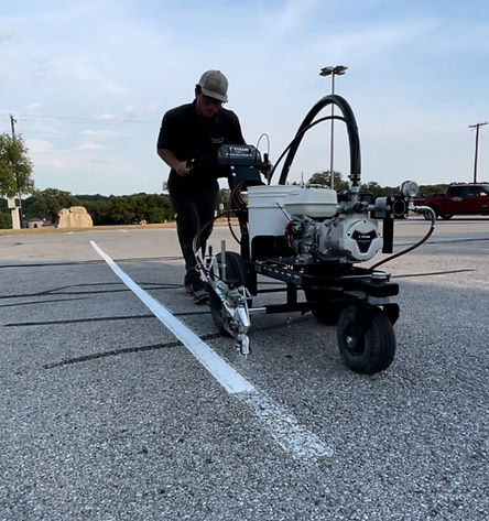 Professional parking lot striping service in Driftwood, TX – High-quality line striping using precision equipment for clear, long-lasting pavement markings. Enhance safety and organization with expertly applied parking lot lines, ADA-compliant markings, and road striping. Trusted striping company in Driftwood, TX.