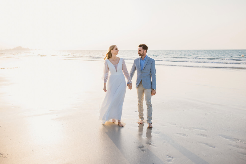 Abu Dhabi civil wedding couple photographed barefoot on Saadiyat Island beach