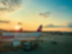 Once registered, the EES data will be valid for three years, and the clock resets with each new entry, unless you change passports, in which case the process starts anew. Airplanes on tarmac during sunset at airport, with fueling truck nearby. Swiss flag on tails, orange sky, calm evening mood.