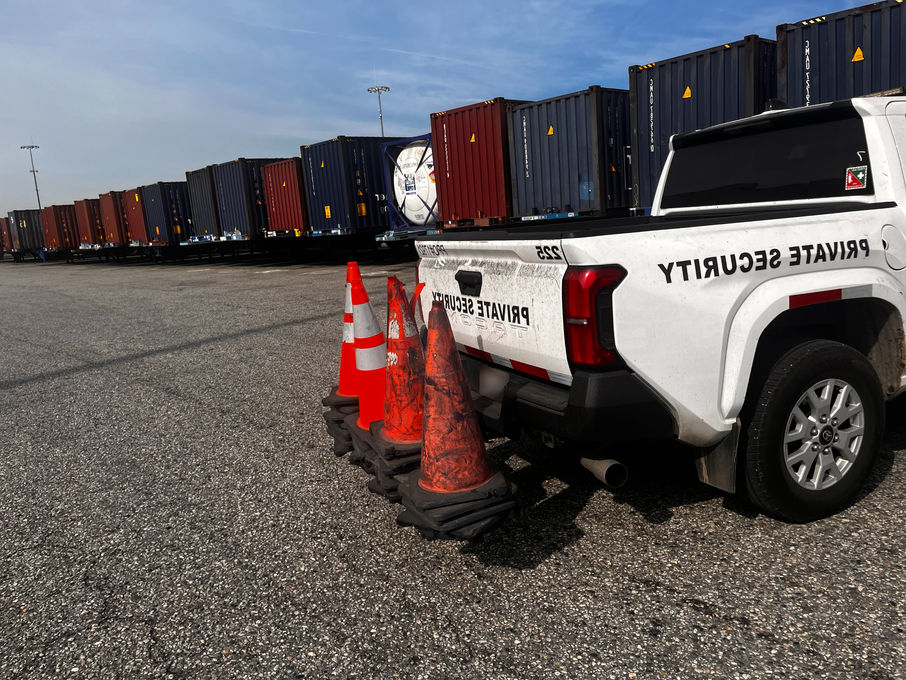 Hitch-mounted cone dispensary storing traffic cones for fast deployment on security vehicles