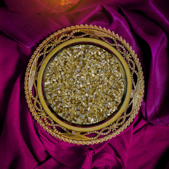 Kabdi gold cut beads aari work material closeup