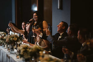 Maid of Honor giving toast at Chicago wedding reception