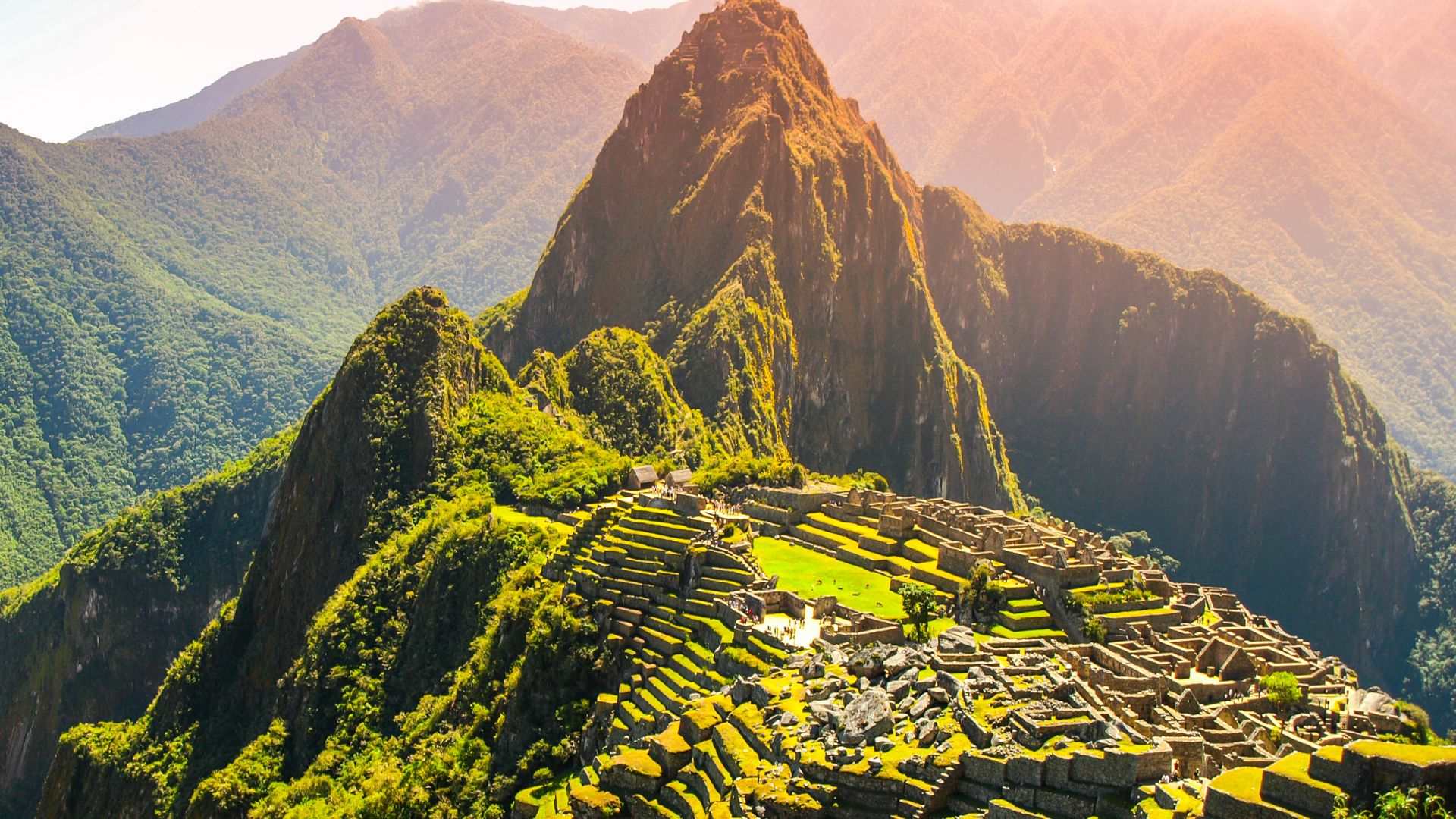Machu Picchu and Huayna Picchu in late golden light