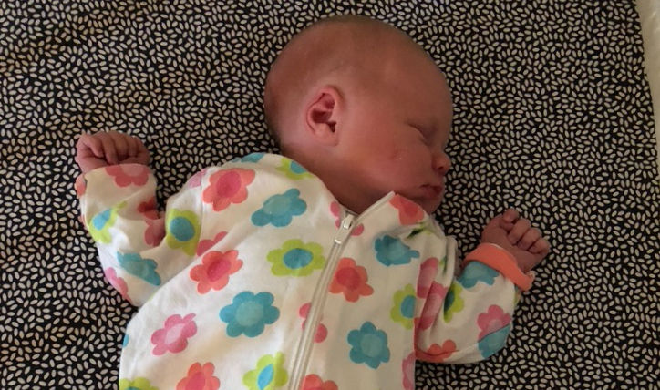 Baby sleeping with a preference of looking to the left (torticollis)