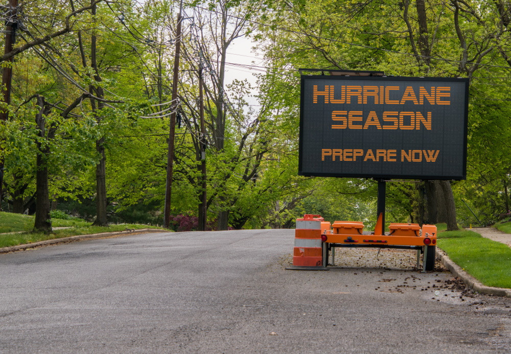 road sign - "hurricane season prepare now"