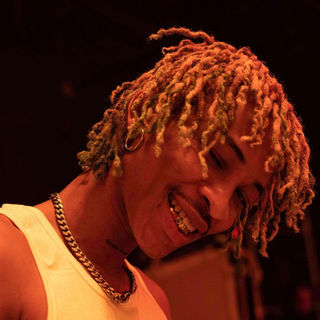 client picture waeting his custom grillz