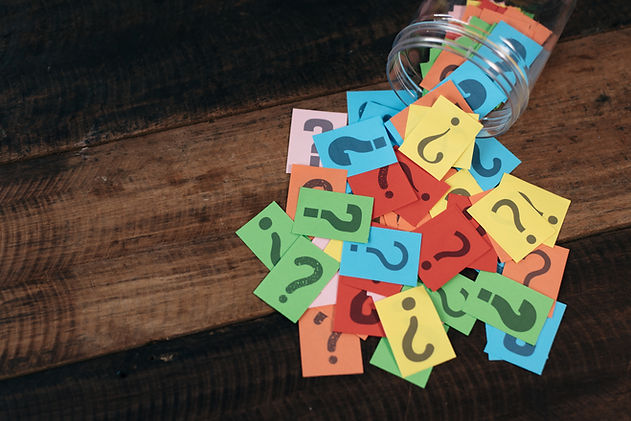 colorful paper with question mark in a p