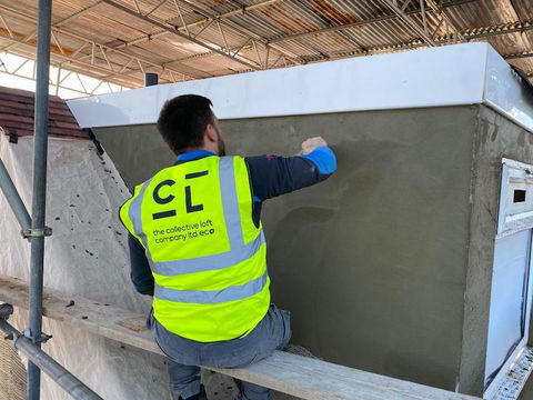 The Construction Collective employee wearing a high-vis