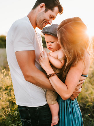 family photo on green grass during golde