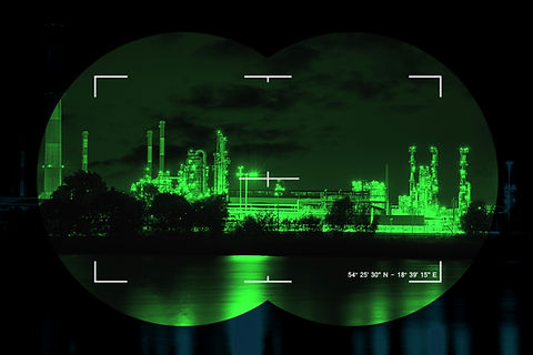 Night vision glass showing an industrial area