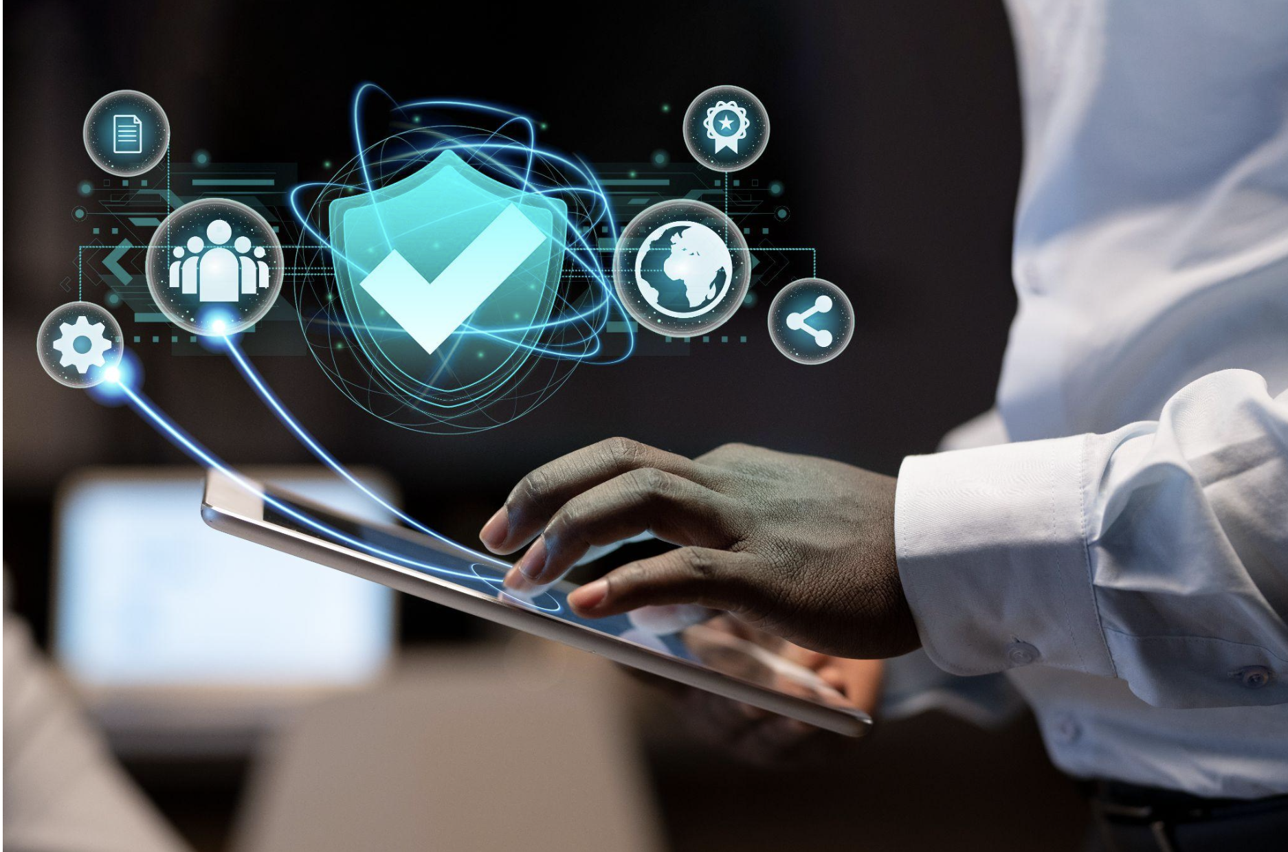 IT professional using an AI security dashboard to protect patient data and ensure healthcare compliance.