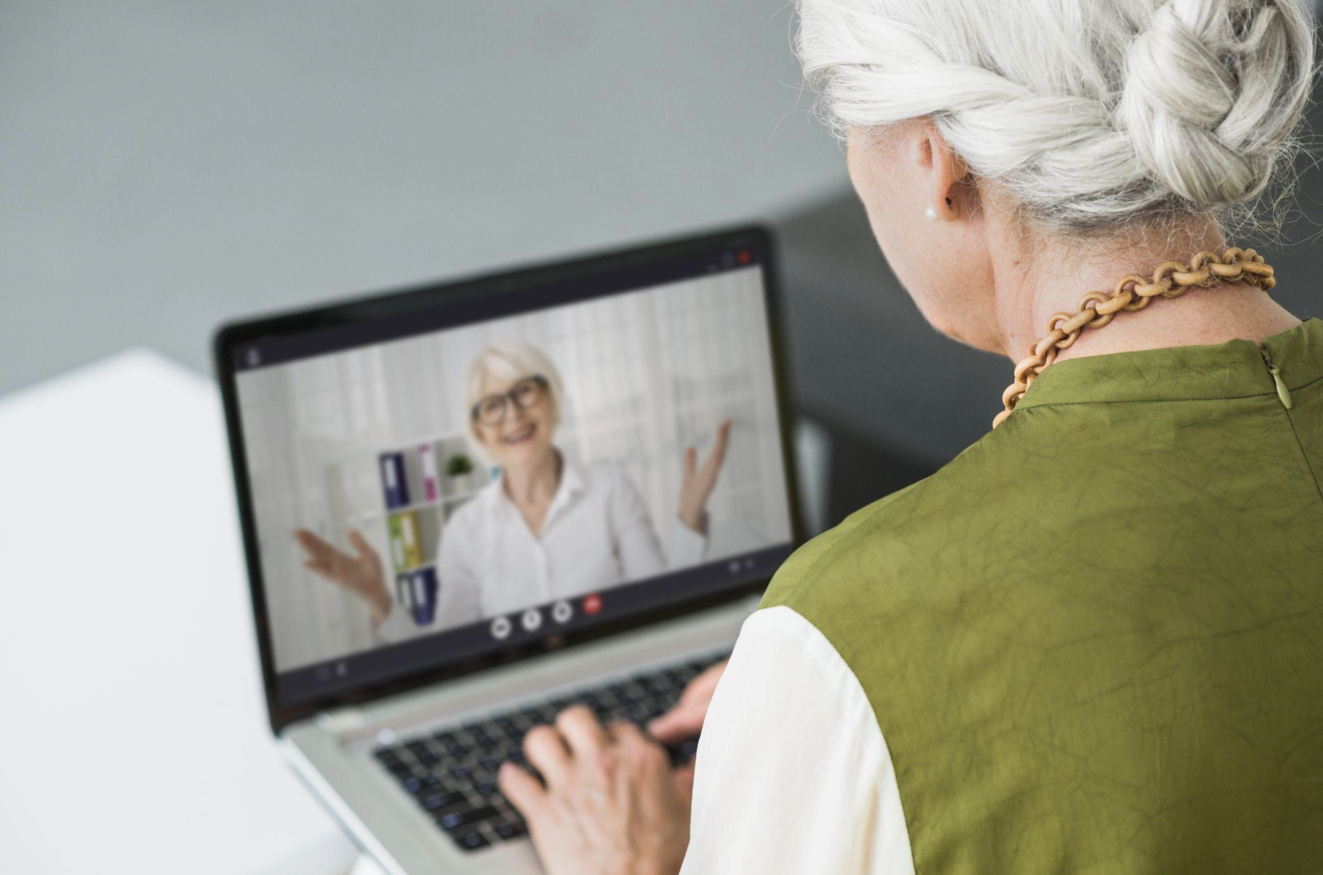 AI-powered telehealth platform with wearable devices tracking patient vitals for remote monitoring.