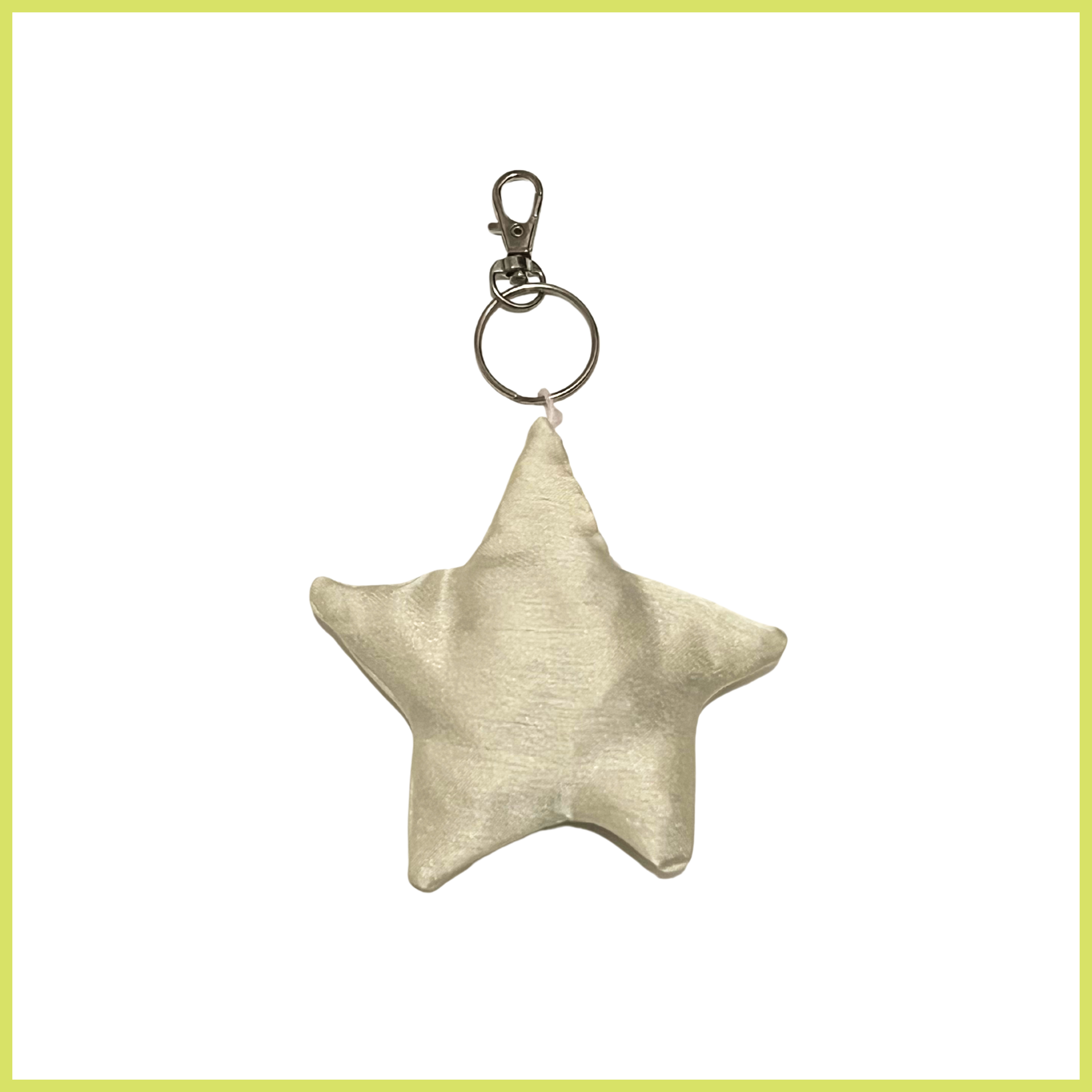 Charm made with off white satin fabric