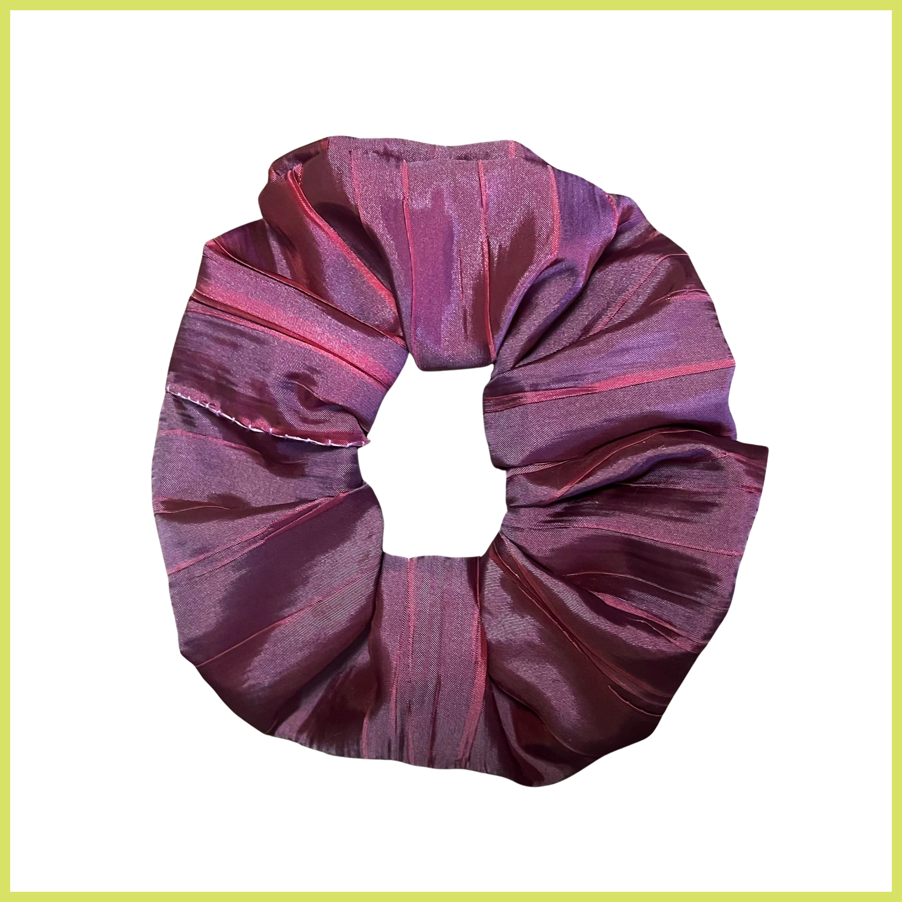 Hair scrunchie made with plum purple colored crinkle fabric