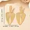 Thumbnail: Gold ribbed earrings 