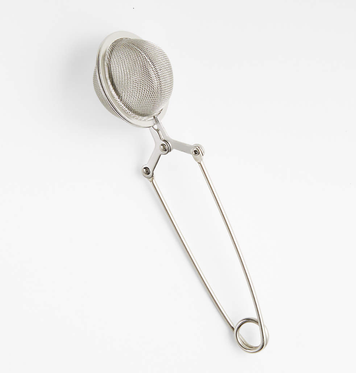 Stainless steel snap infuser tea ball with handle.