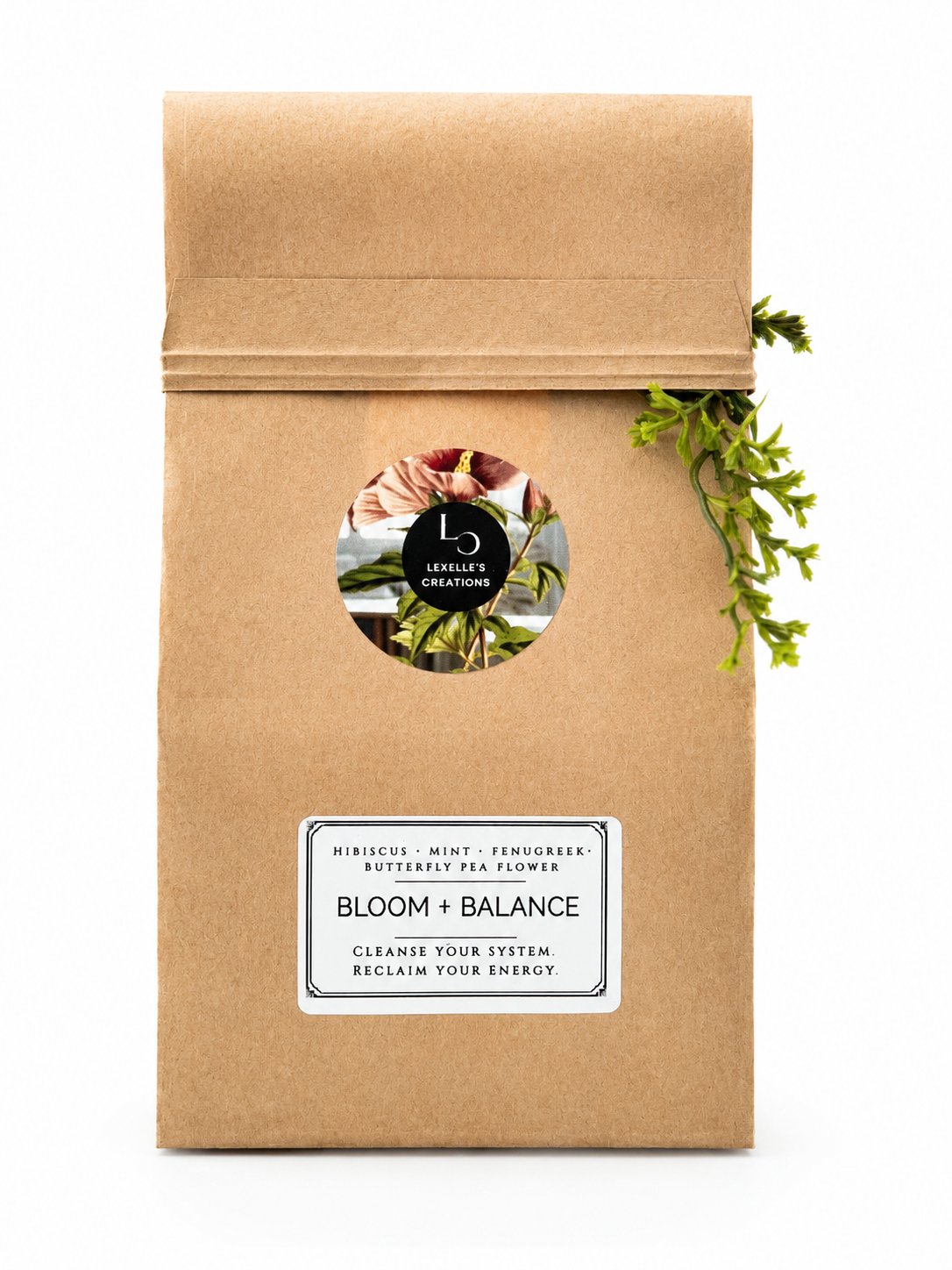 Bloom & Balance Hibiscus Blend tea in a brown paper bag.