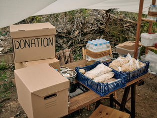 Donation boxes and humanitarian supplies in a warehouse