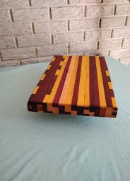 Thumbnail: Caos exotic hardwoods puzzle style cutting board 