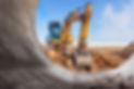 heavy-excavator-construction-site-view-excavator-through-iron-pipe-construction-equipment-