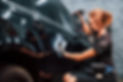 final-polishing-modern-black-automobile-get-cleaned-by-woman-inside-car-wash-station.jpg