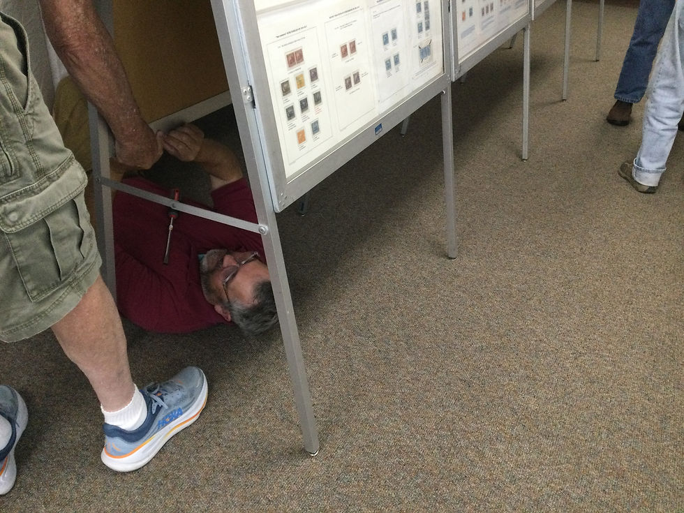 Thursday night setup -- erecting the exhibit frames