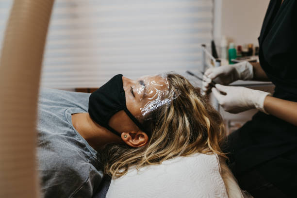 Specialist performing scalp treatment during Hair Restoration Reimagined at California Aesthetics session