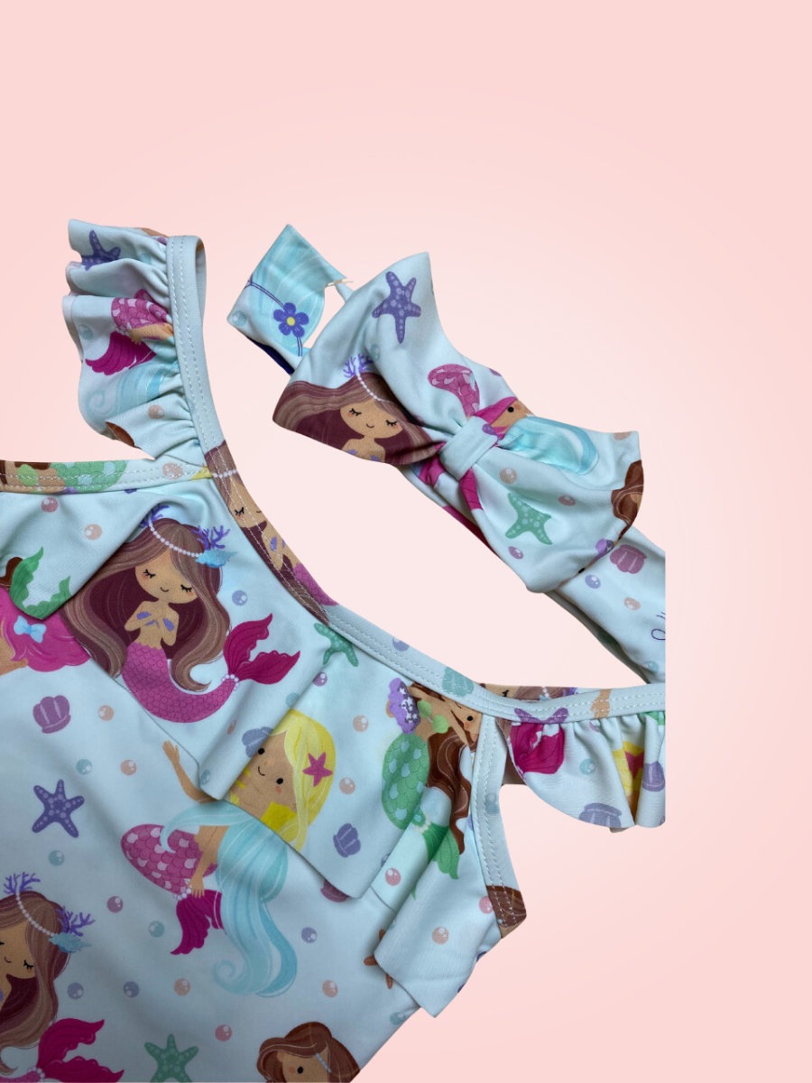 Thumbnail: Side view of one piece swimsuit with headband