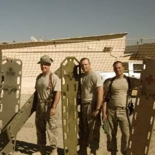 Michael (center) and some of his unit brothers in Afghanistan.