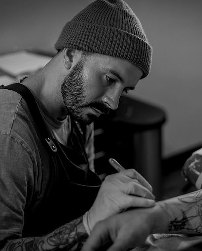 Neotraditional tattoo artist Adam Obrien in Austin, Texas, blending traditional and modern tattoo aesthetics. Specializing in vibrant and intricate designs that capture meaningful narratives and artistic expression