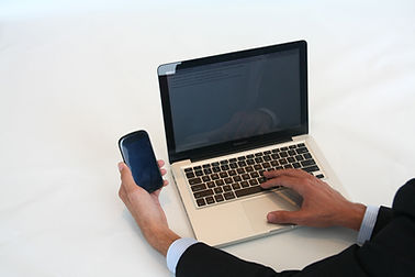 A laptop and mobile phone