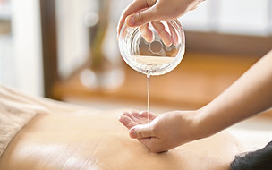 Pouring-Massage-Oil_edited_edited.jpg
