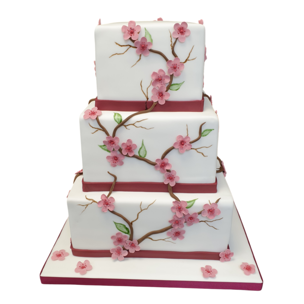 Three-tier white wedding cake with cherry blossoms and burgundy ribbon accents.