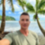 Queer expat enjoying beach life in Costa Rica — living the Pura Vida lifestyle with sun, sand, and ocean views. Costa Rica offers a vibrant LGBTQ-friendly culture, stunning beaches, and a slower pace of life perfect for leaving burnout behind