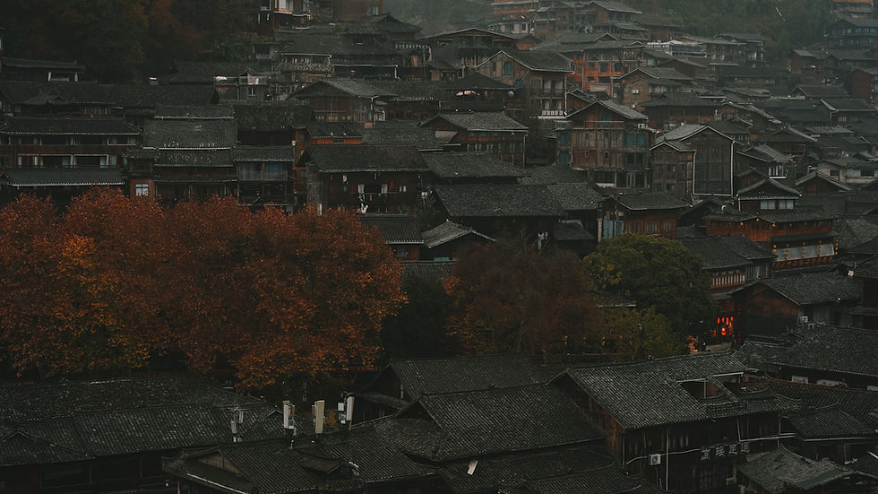 View of traditional wooden buildings in Xijiang Qianhu Miao Village, Guizhou, China