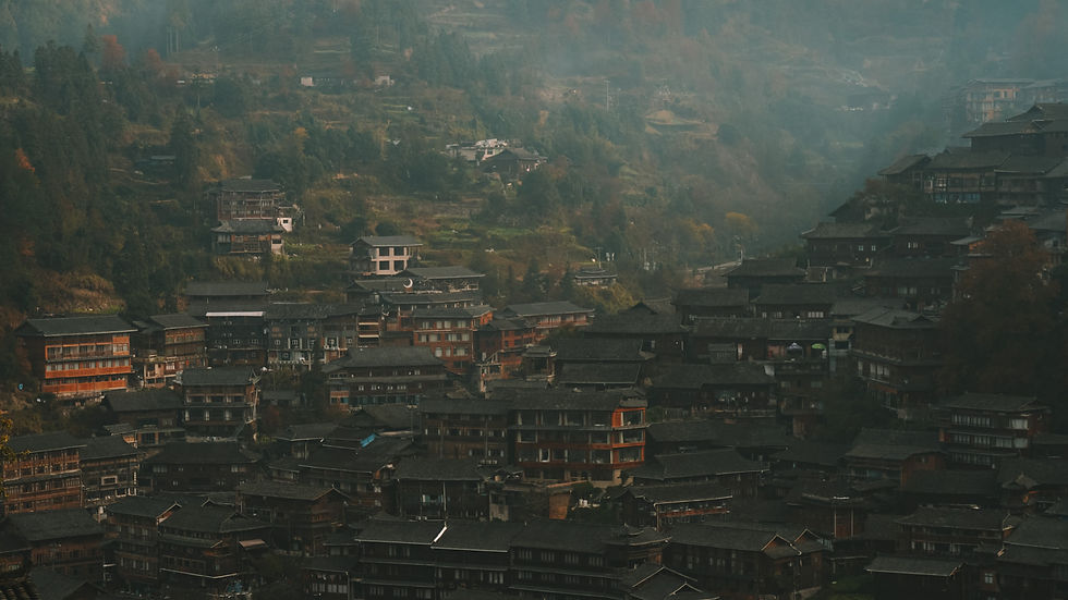 View of traditional wooden buildings in Xijiang Qianhu Miao Village, Guizhou, China
