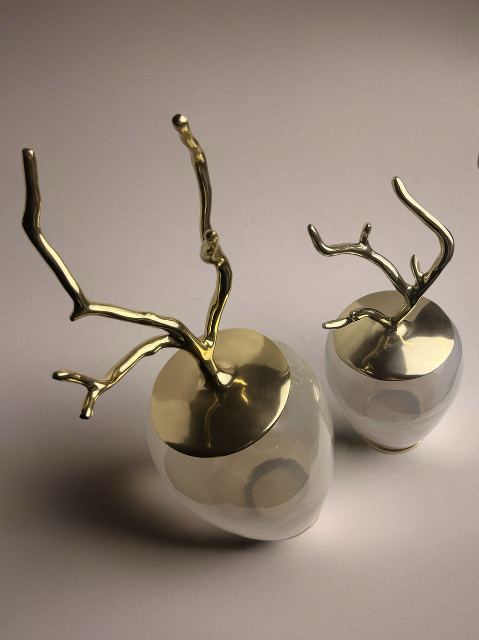 Thumbnail: top view of two amber smoke glass jars shown together