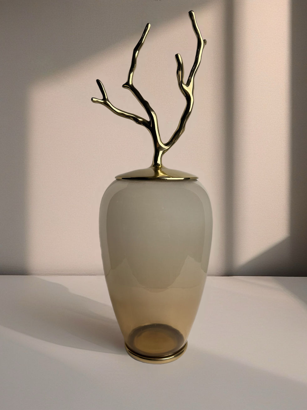 Thumbnail: single modern glass jar with closed golden branch lid