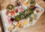 Aerial photograph of food on a kitchen counter with Chef Kiernen cooking