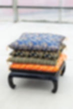 Floor Pillows $10; Tea Table $18